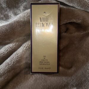 White diamonds, eau de toilet spray, one fluid ounce/30 mL ￼ never opened ￼